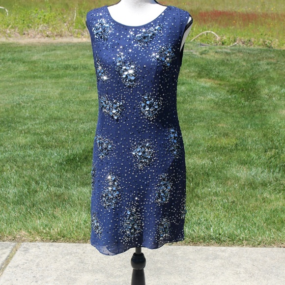 Badgley Mischka Dresses & Skirts - Badgley Mischka navy blue sleeveless sequin dress.....